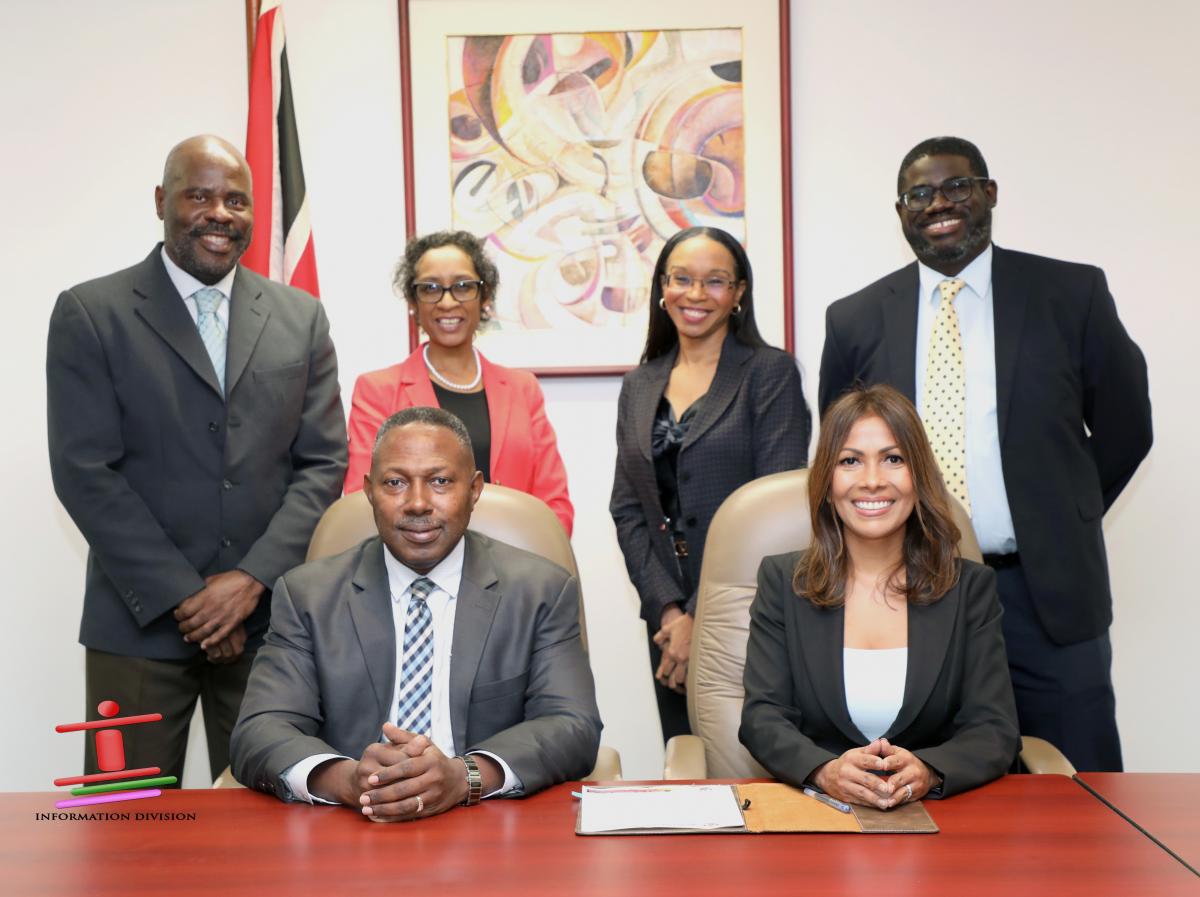 Standing from left: Ministry of Public Administration Deputy Permanent Secretary, Mr Ray McCarthy, with Deputy Permanent Secretary Ms Abigail Bynoe and PwC Advisory Services Limited Senior Manager, Proposal and Pursuit, Ms Tuwana Aubin-Anthony, with Mr Shermarke Howard, Director, Advisory Services. Seated from left: Permanent Secretary, Mr Claudelle McKellar with PwC Advisory Services Limited Partner, Consulting Leader, Ms Zia Paton.