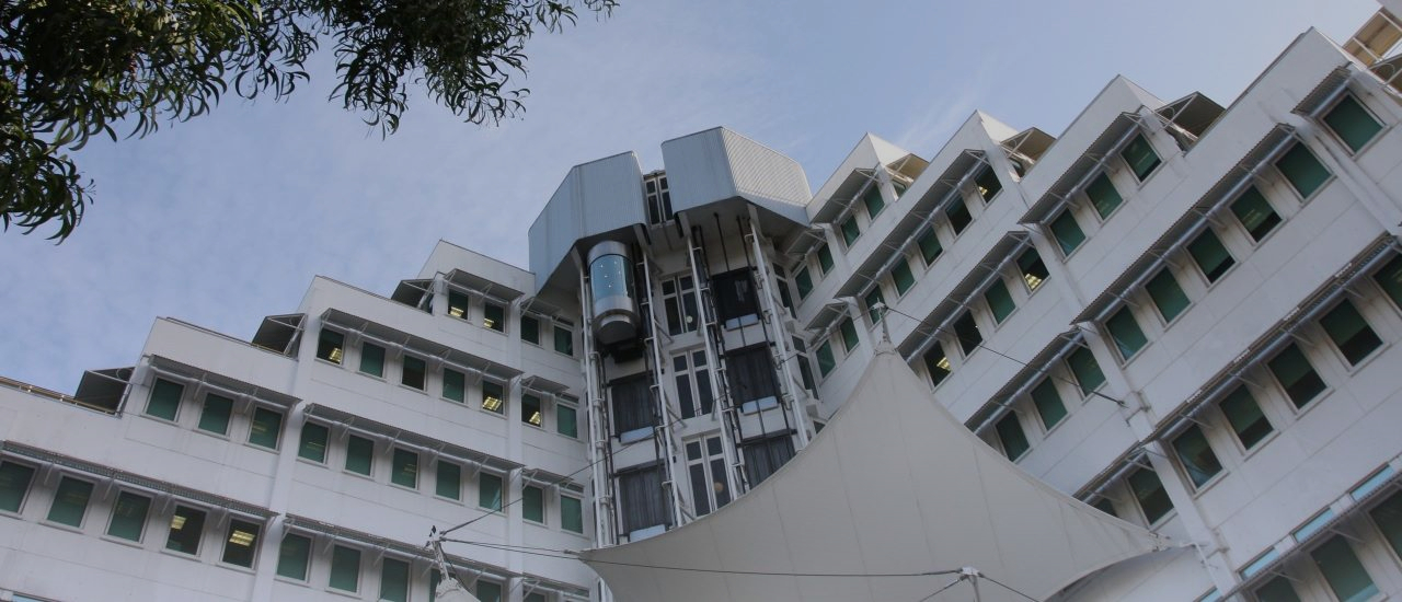 Upward facing angle of The Nalis Building that is home to the Ministry of Public Administration