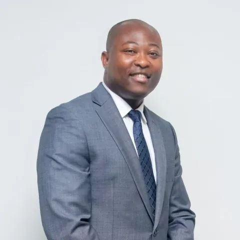 Permanent Secretary (Ag.) Cory Belfon in standing pose